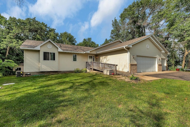 16474 63rd St SE, Becker, MN 55308 - view of front of property featuring a garage, a front lawn, driveway, a shingled roof, and brick siding