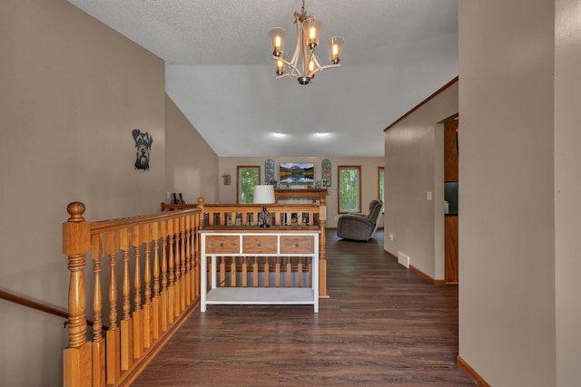 16474 63rd St SE, Becker, MN 55308 - hall with wood finished floors, a chandelier, an upstairs landing, and lofted ceiling