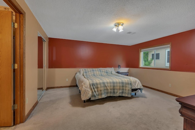 16474 63rd St SE, Becker, MN 55308 - carpeted bedroom with a textured ceiling and baseboards