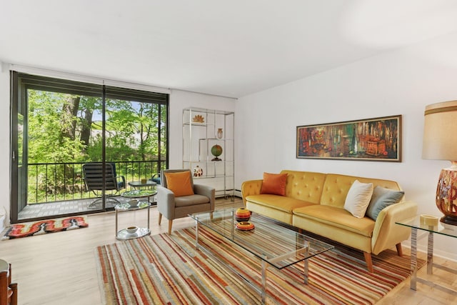 6085 Lincoln Dr Unit 123, Edina, MN 55436 - living area featuring healthy amount of natural light and wood finished floors