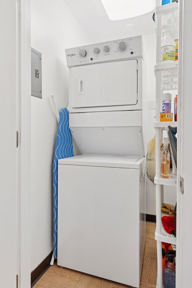6085 Lincoln Dr Unit 123, Edina, MN 55436 - washroom with stacked washer / dryer