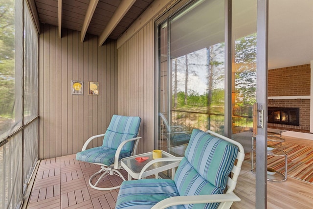 6085 Lincoln Dr Unit 123, Edina, MN 55436 - sunroom featuring a fireplace
