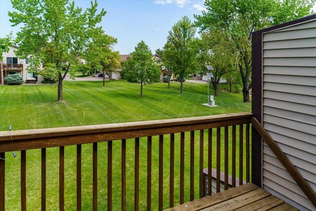 10382 Juniper Ln, Eden Prairie, MN 55347 - wooden terrace featuring a lawn