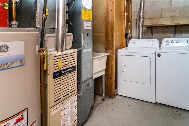 10382 Juniper Ln, Eden Prairie, MN 55347 - laundry area featuring independent washer and dryer and water heater