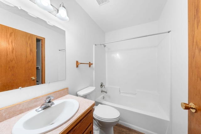 39094 Riverside Ct, North Branch, MN 55056 - bathroom with toilet, vanity, and shower / bath combination