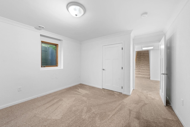 39094 Riverside Ct, North Branch, MN 55056 - unfurnished bedroom with crown molding, carpet floors, and baseboards