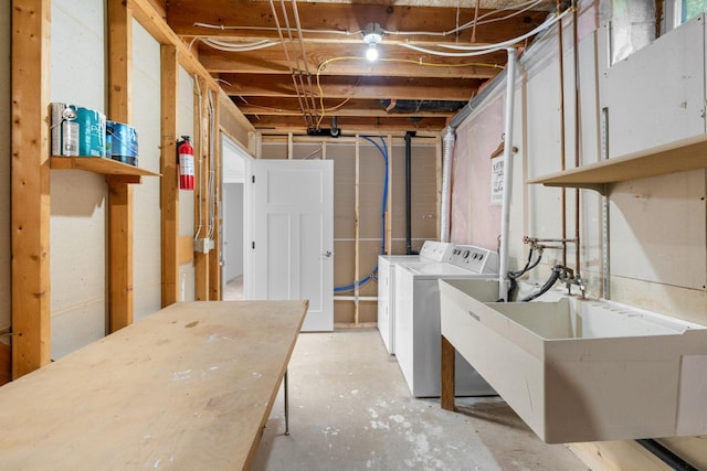 39094 Riverside Ct, North Branch, MN 55056 - unfinished below grade area featuring a sink and washer and dryer