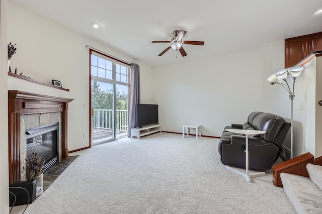 1595 Fox Hunt Way, Victoria, MN 55386 - sitting room featuring ceiling fan, a tiled fireplace, carpet flooring, baseboards, and recessed lighting