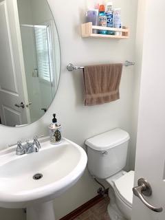 1595 Fox Hunt Way, Victoria, MN 55386 - bathroom featuring toilet and a sink