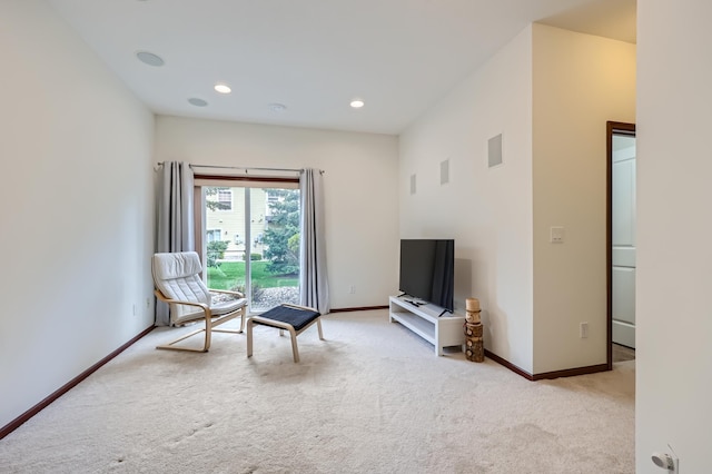 1595 Fox Hunt Way, Victoria, MN 55386 - living area featuring light colored carpet, baseboards, and recessed lighting
