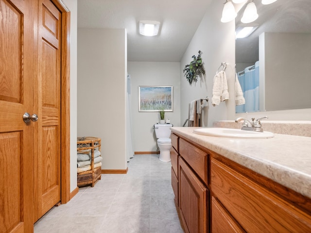 116 Street Cir Unit 104, Miltona, MN 56354 - bathroom with toilet, vanity, baseboards, and a shower with shower curtain