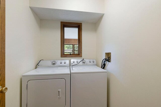 laundry room with washer and dryer
