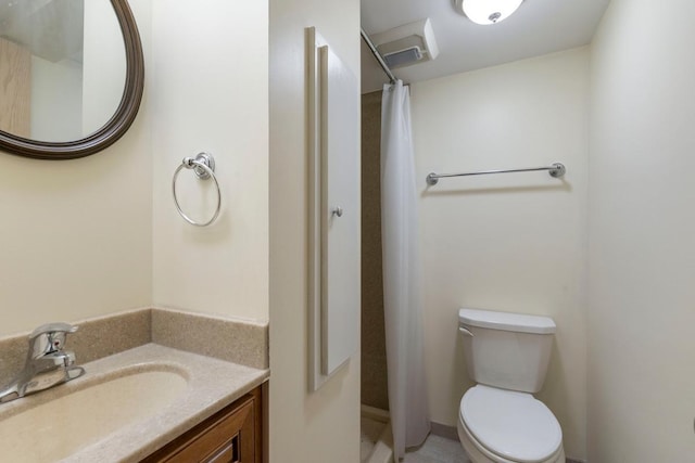 bathroom with a shower with shower curtain, toilet, and vanity
