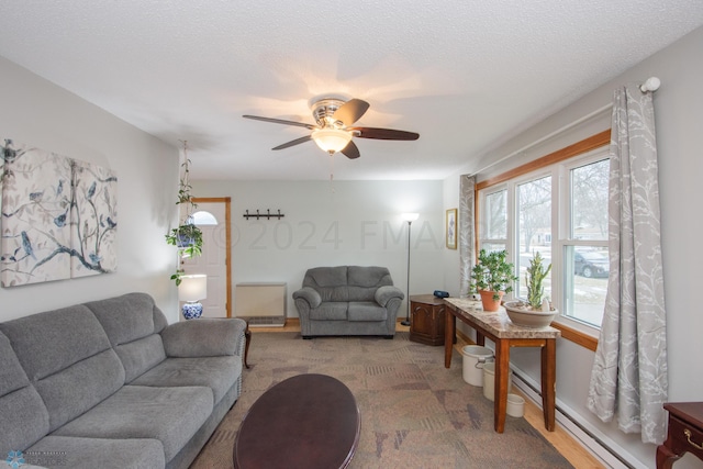 living room with ceiling fan and a baseboard radiator