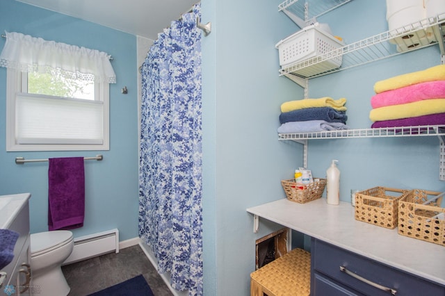 full bathroom featuring a baseboard heating unit, toilet, curtained shower, and baseboards