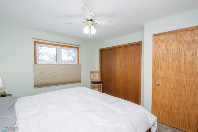 bedroom with a closet, carpet, and a ceiling fan