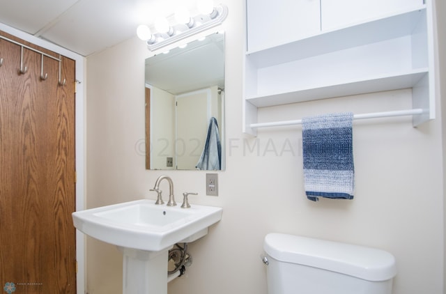 half bathroom with toilet