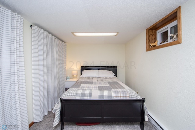 bedroom featuring carpet floors and a baseboard radiator