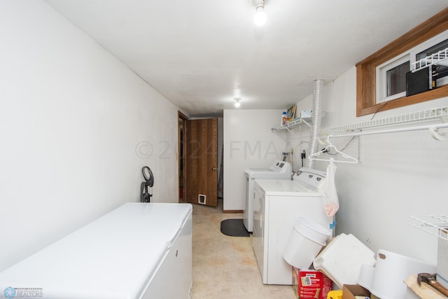 washroom featuring separate washer and dryer