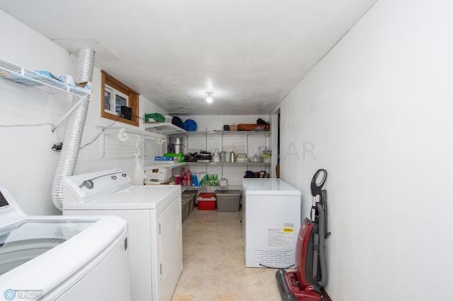 laundry area with independent washer and dryer
