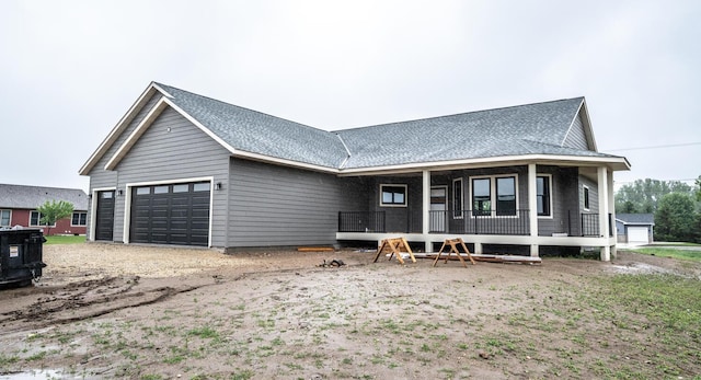 29194 Cynthia Path, Randolph, MN 55065 - view of front of home featuring a garage, covered porch, and a shingled roof