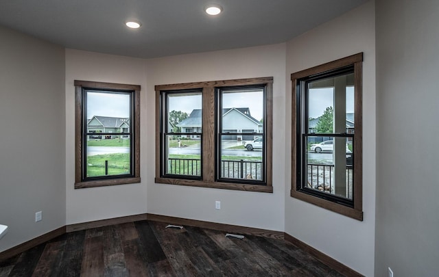 29194 Cynthia Path, Randolph, MN 55065 - empty room featuring baseboards, dark wood-style floors, and recessed lighting