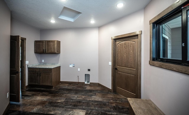29194 Cynthia Path, Randolph, MN 55065 - laundry room with dark wood-type flooring, cabinet space, baseboards, and recessed lighting