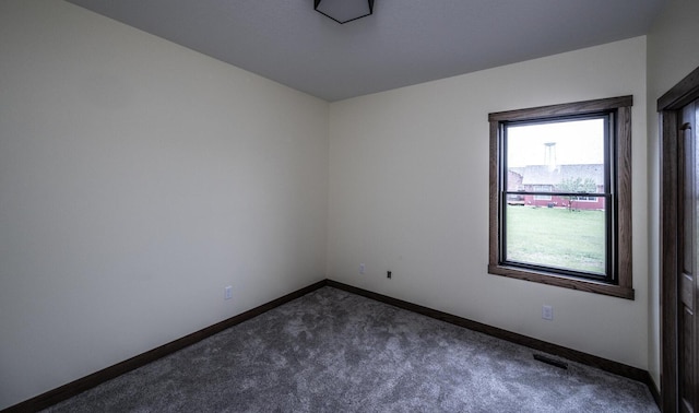 29194 Cynthia Path, Randolph, MN 55065 - spare room featuring dark carpet and baseboards