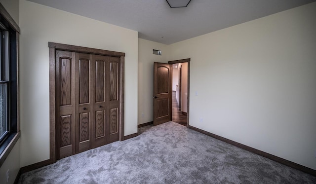 29194 Cynthia Path, Randolph, MN 55065 - unfurnished bedroom with carpet floors, baseboards, and a closet