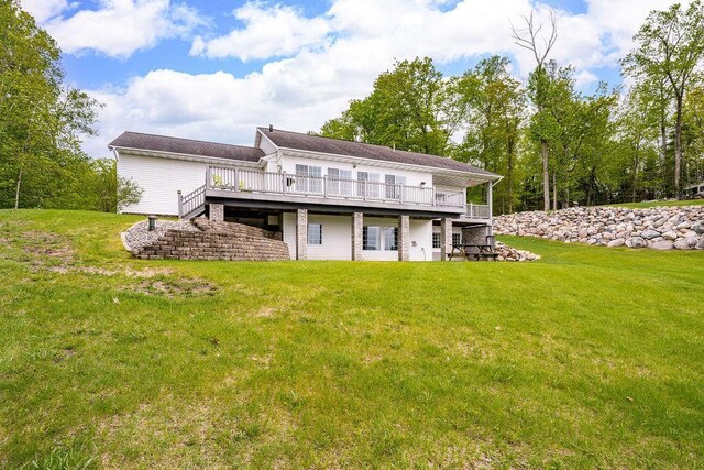 23324 Tioga Beach Rd, Cohasset, MN 55721 - back of house featuring a deck and a yard