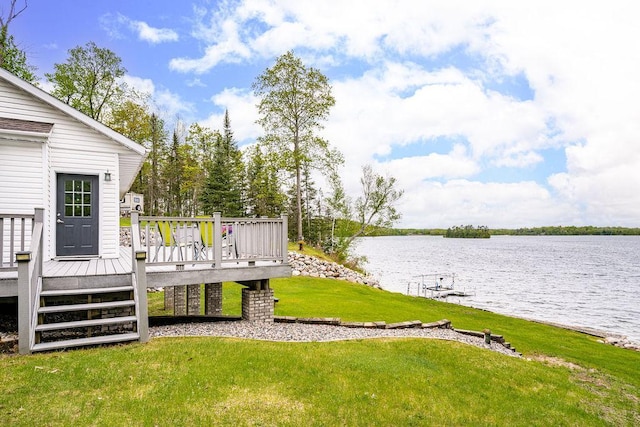 23324 Tioga Beach Rd, Cohasset, MN 55721 - view of green lawn featuring a deck with water view