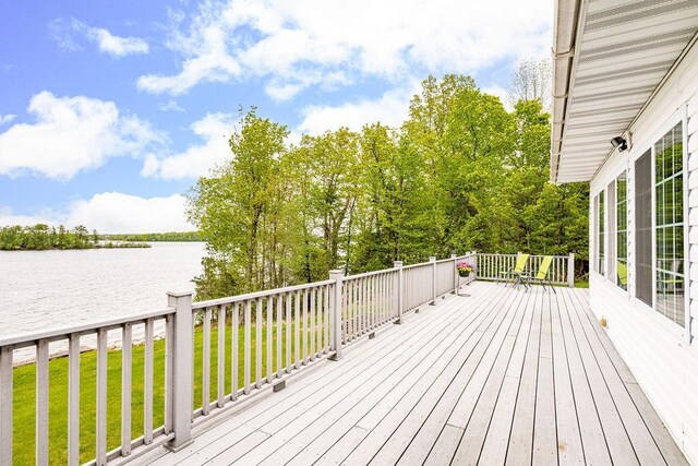23324 Tioga Beach Rd, Cohasset, MN 55721 - wooden terrace with a water view and a lawn