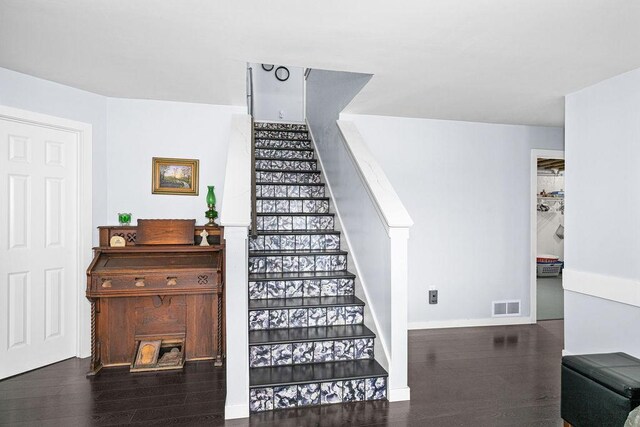 23324 Tioga Beach Rd, Cohasset, MN 55721 - stairs featuring wood finished floors and baseboards