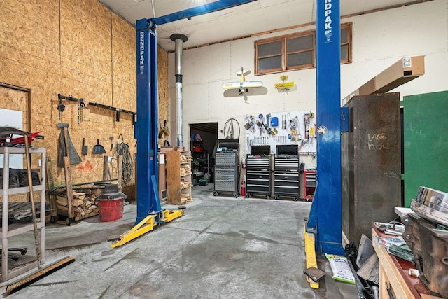 23324 Tioga Beach Rd, Cohasset, MN 55721 - garage featuring a workshop area