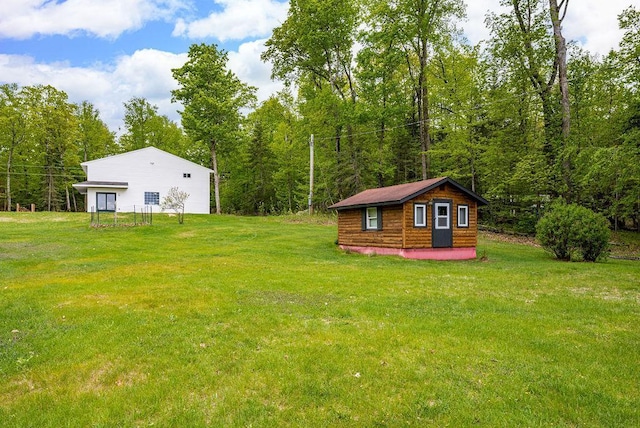 23324 Tioga Beach Rd, Cohasset, MN 55721 - view of grassy yard with an outbuilding and a forest view