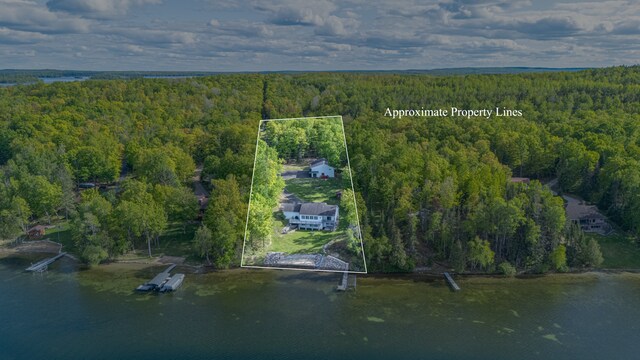 23324 Tioga Beach Rd, Cohasset, MN 55721 - aerial view of property and surrounding area with a heavily wooded area, property parcel outlined, and a nearby body of water