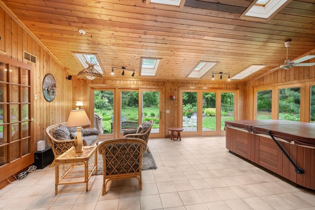 14 Overlook Rd, Dellwood, MN 55110 - sunroom / solarium featuring a skylight, track lighting, a jacuzzi, french doors, and lofted ceiling