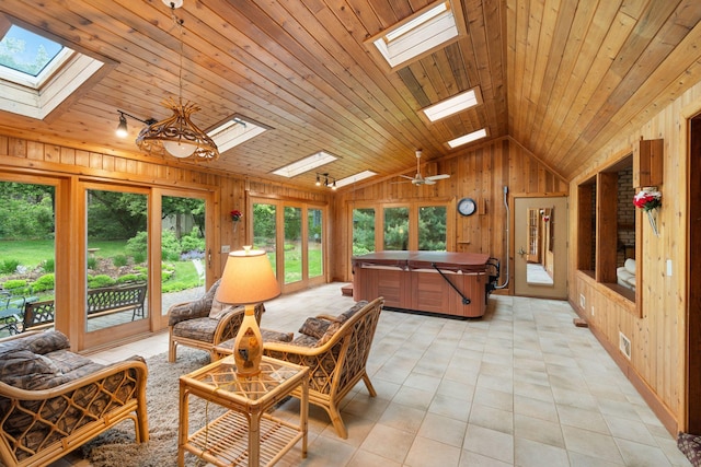 14 Overlook Rd, Dellwood, MN 55110 - sunroom with a skylight, a jacuzzi, vaulted ceiling, and plenty of natural light