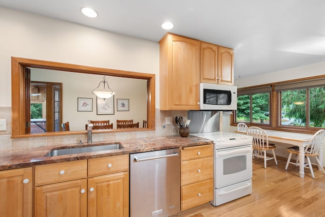 14 Overlook Rd, Dellwood, MN 55110 - kitchen featuring white appliances, a sink, stone counters, and tasteful backsplash