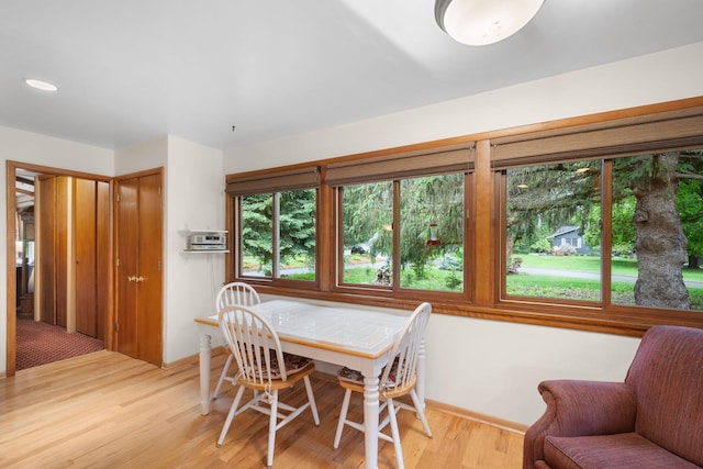 14 Overlook Rd, Dellwood, MN 55110 - dining room with plenty of natural light, light wood-style flooring, and baseboards