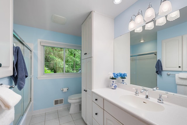 14 Overlook Rd, Dellwood, MN 55110 - full bath with toilet, vanity, tile patterned flooring, and baseboards