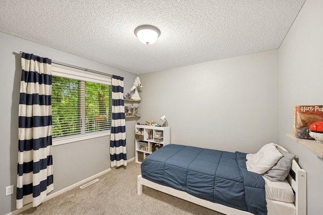 5101 201st St N, Forest Lake, MN 55025 - carpeted bedroom featuring a textured ceiling and baseboards