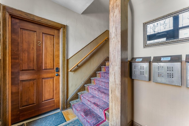 2895 James Ave S Unit 2, Minneapolis, MN 55408 - staircase featuring wood finished floors
