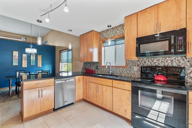 7734 Lancaster Ave NE, Otsego, MN 55301 - kitchen featuring black appliances, a peninsula, decorative backsplash, and a chandelier
