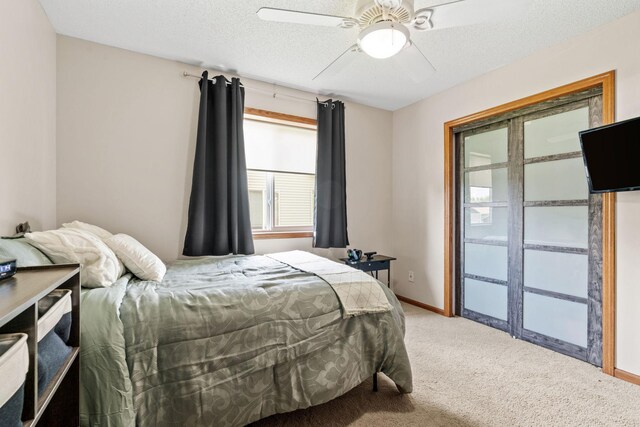 7734 Lancaster Ave NE, Otsego, MN 55301 - bedroom featuring light colored carpet, a ceiling fan, and a textured ceiling
