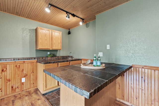 7734 Lancaster Ave NE, Otsego, MN 55301 - kitchen featuring track lighting, a textured wall, light brown cabinets, a peninsula, and wooden ceiling