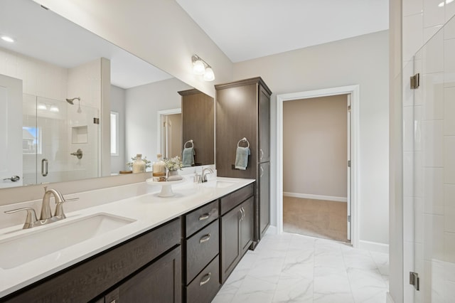 464 Whitewater Ct, Delano, MN 55328 - bathroom featuring a stall shower, marble finish flooring, double vanity, and baseboards