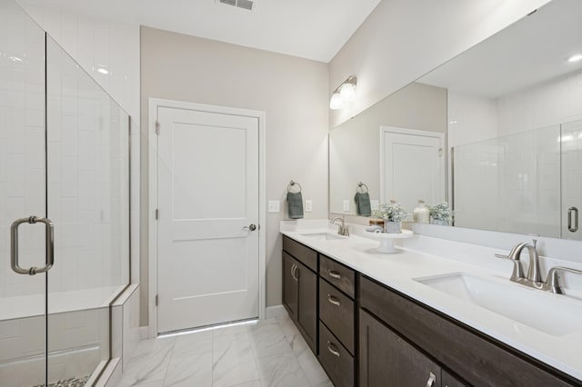 464 Whitewater Ct, Delano, MN 55328 - bathroom featuring a shower stall, double vanity, and marble look tile flooring