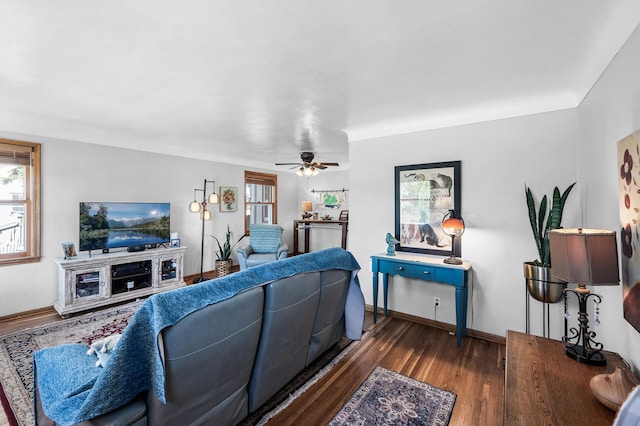 1551 Margaret St, Saint Paul, MN 55106 - living area featuring wood finished floors, baseboards, and a ceiling fan