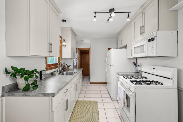 1551 Margaret St, Saint Paul, MN 55106 - kitchen with white appliances, a sink, light tile patterned flooring, and pendant lighting